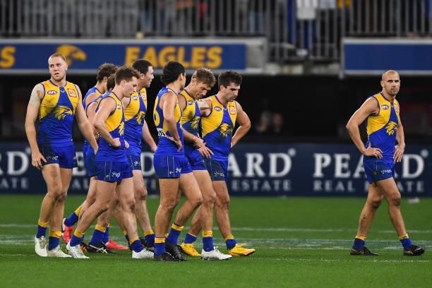 The Eagles leave the field after the loss during the 2021 AFL Round 21 match between the West Coast Eagles and the Melbourne Demons at Optus Stadium...
