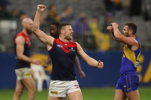 Steven May of the Demons celebrates after the teams win during the 2021 AFL Round 21 match between the West Coast Eagles and the Melbourne Demons at...