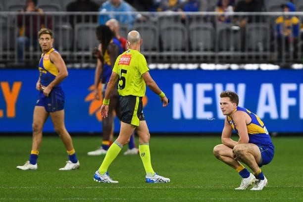 Alex Witherden of the Eagles looks dejected after a loss during the 2021 AFL Round 21 match between the West Coast Eagles and the Melbourne Demons at...