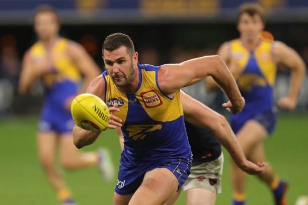 Jack Darling of the Eagles chases the ball during the 2021 AFL Round 21 match between the West Coast Eagles and the Melbourne Demons at Optus Stadium...