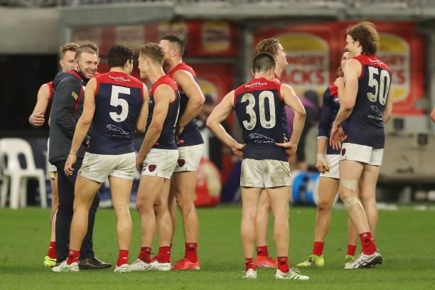 Simon Goodwin, Senior Coach of the Demons celebrates after the teams win during the 2021 AFL Round 21 match between the West Coast Eagles and the...