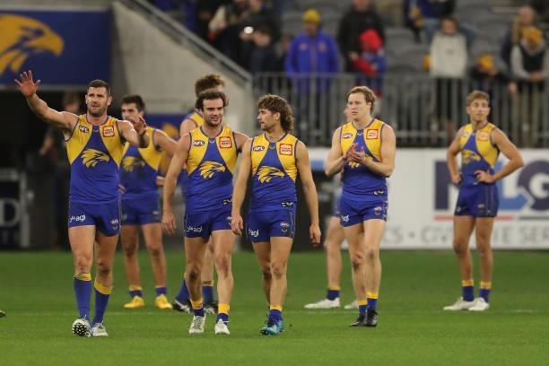 The Eagles leave the field after the teams defeat during the 2021 AFL Round 21 match between the West Coast Eagles and the Melbourne Demons at Optus...