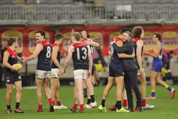 Simon Goodwin, Senior Coach of the Demons celebrates after the teams win during the 2021 AFL Round 21 match between the West Coast Eagles and the...