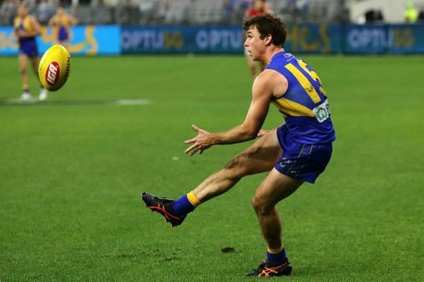 Jamie Cripps of the Eagles kicks the ball during the 2021 AFL Round 21 match between the West Coast Eagles and the Melbourne Demons at Optus Stadium...