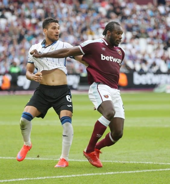 West Han United's Michail Antonio and Atalanta's Jose Luis Palomino during the Betway Cup match between West Ham United and Atalanta at London...
