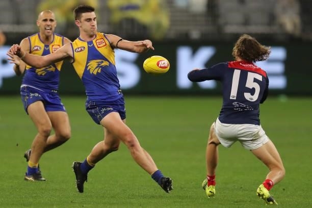 Elliot Yeo of the Eagles kicks the ball during the 2021 AFL Round 21 match between the West Coast Eagles and the Melbourne Demons at Optus Stadium on...