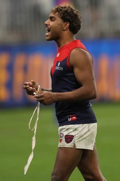 Neville Jetta of the Demons shouts to fans and family after the 2021 AFL Round 21 match between the West Coast Eagles and the Melbourne Demons at...