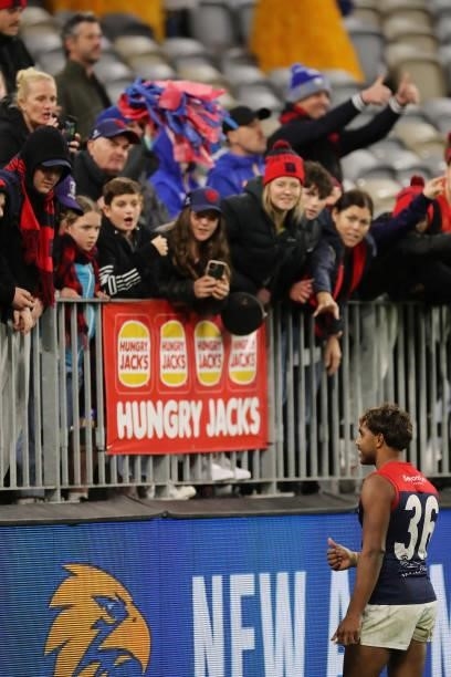Kysaiah Pickett of the Demons speaks to fans and family after the 2021 AFL Round 21 match between the West Coast Eagles and the Melbourne Demons at...