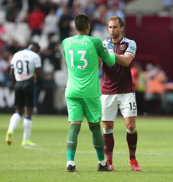 West Han United's Alphonse Areola and Craig Dawson at the end of the game during the Betway Cup match between West Ham United and Atalanta at London...