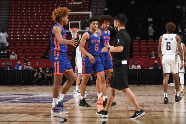 Quentin Grimes of the New York Knicks and Jericho Sims of the New York Knicks look on during the 2021 Las Vegas Summer League on August 9, 2021 at...