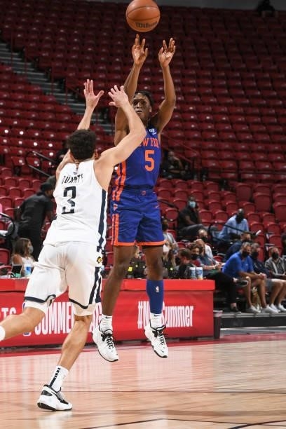 Immanuel Quickley of the New York Knicks shoots the ball as Chris Duarte of the Indiana Pacers plays defense during the 2021 Las Vegas Summer League...