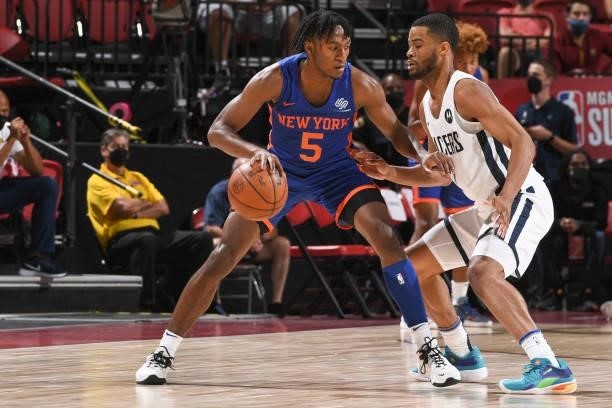 Immanuel Quickley of the New York Knicks handles the ball as Cassius Stanley of the Indiana Pacers plays defense during the 2021 Las Vegas Summer...