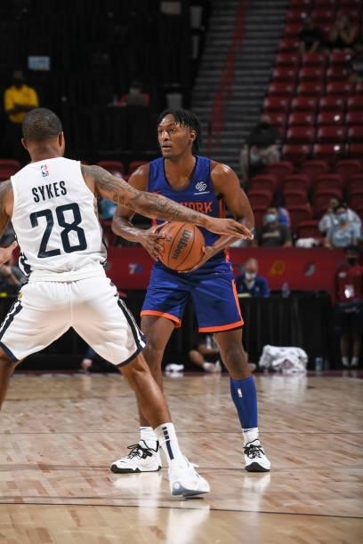 Immanuel Quickley of the New York Knicks handles the ball during the 2021 Las Vegas Summer League on August 9, 2021 at the Thomas & Mack Center in...