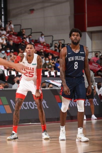 Troy Baxter Jr. #25 of the Chicago Bulls and Naji Marshall of the New Orleans Pelicans look on during the 2021 Las Vegas Summer League on August 9,...