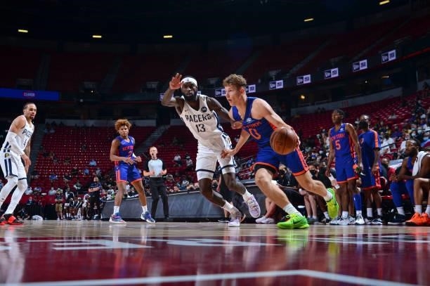 Rokas Jokubaitis of the New York Knicks handles the ball as B.J. Johnson of the Indiana Pacers plays defense during the 2021 Las Vegas Summer League...