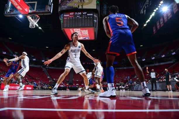 Chris Duarte of the Indiana Pacers plays defense as Immanuel Quickley of the New York Knicks handles the ball during the 2021 Las Vegas Summer League...