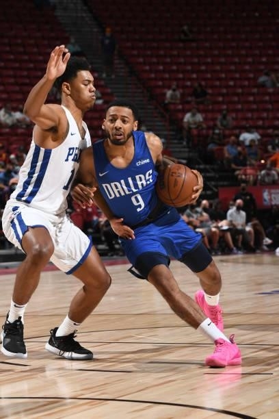 Carlik Jones of the Dallas Mavericks drives to the basket during the game against the Philadelphia 76ers during the 2021 Las Vegas Summer League on...