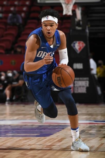 Tyrell Terry of the Dallas Mavericks dribbles the ball during the game against the Philadelphia 76ers during the 2021 Las Vegas Summer League on...