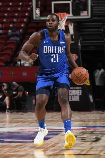 Eugene Omoruyi of the Dallas Mavericks dribbles the ball during the game against the Philadelphia 76ers during the 2021 Las Vegas Summer League on...