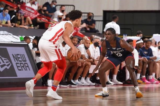 Devon Dotson of the Chicago Bulls handles the ball as Kira Lewis Jr. #13 of the New Orleans Pelicans plays defense during the 2021 Las Vegas Summer...