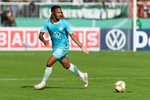 Kevin Mbabu of VfL Wolfsburg controls the ball during the DFB Cup first round match between Preussen Muenster and VfL Wolfsburg at Preussenstadion on...