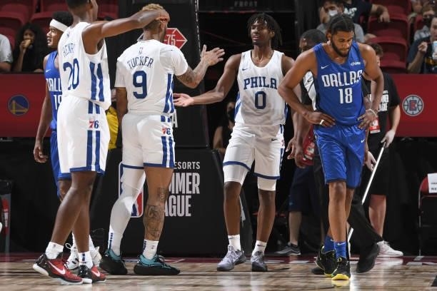 Tyrese Maxey hi-fives Rayjon Tucker of the Philadelphia 76ers during the game against the Dallas Mavericks during the 2021 Las Vegas Summer League on...