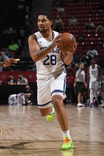 Daishen Nix of the Philadelphia 76ers dribbles the ball during the game against the Dallas Mavericks during the 2021 Las Vegas Summer League on...