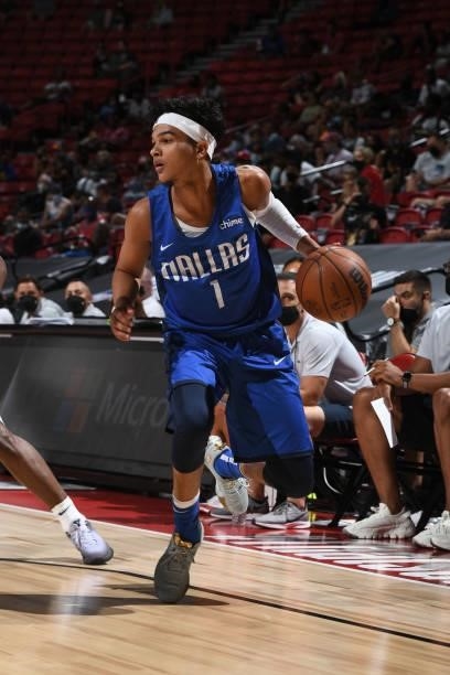 Tyrell Terry of the Dallas Mavericks dribbles the ball during the game against the Philadelphia 76ers during the 2021 Las Vegas Summer League on...