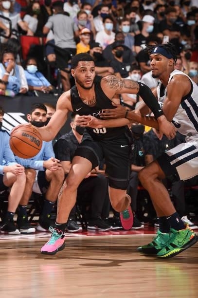 Quinndary Weatherspoon of the Brooklyn Nets handles the ball as Ziaire Williams of the Memphis Grizzlies plays defense during the 2021 Las Vegas...
