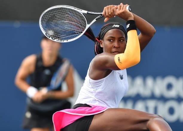 Cori Gauff of the United States prepares to return a shot during her Womens Doubles first round match against Veronika Kudermetova of Russia and...