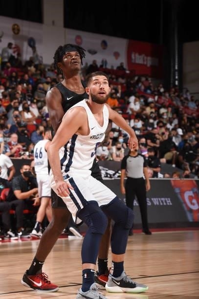 Alize Johnson of the Brooklyn Nets and Killian Tillie of the Memphis Grizzlies fight for position during the 2021 Las Vegas Summer League on August...