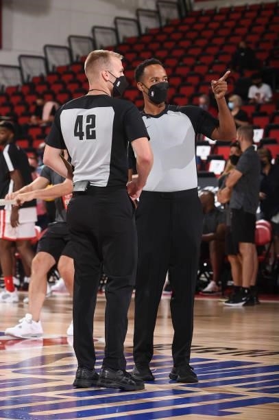 Referee Tyler Ricks and referee Ian McClenny look on during the game between the New Orleans Pelicans and Chicago Bulls during the 2021 Las Vegas...