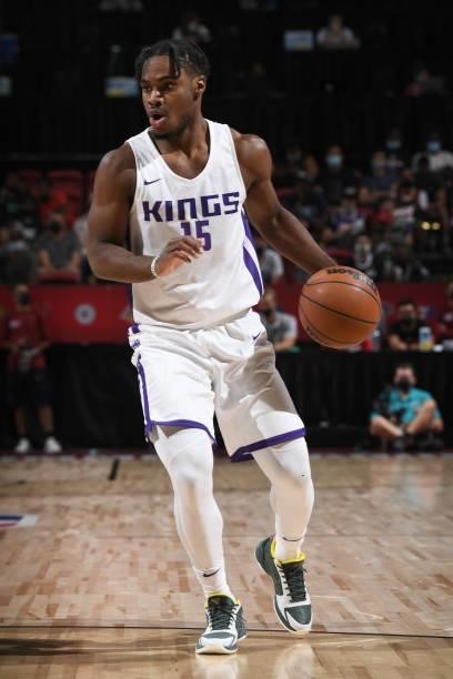 Davion Mitchell of the Sacramento Kings dribbles the ball during the game against the Charlotte Hornets during the 2021 Las Vegas Summer League on...
