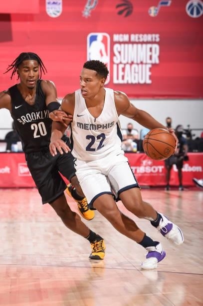 Desmond Bane of the Memphis Grizzlies handles the ball as David Duke of the Brooklyn Nets plays defense during the 2021 Las Vegas Summer League on...