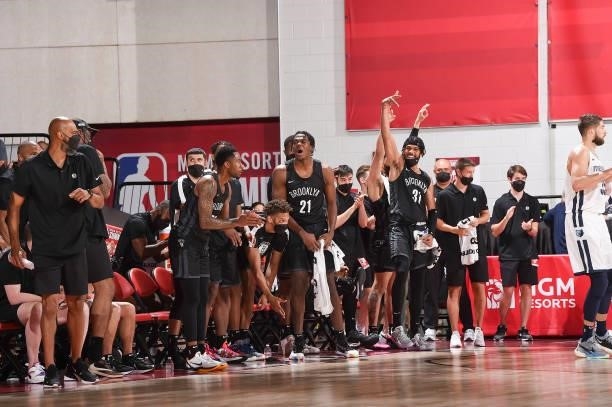 DayRon Sharpe of the Brooklyn Nets and Kaiser Gates of the Brooklyn Nets react to a play during the 2021 Las Vegas Summer League on August 9, 2021 at...