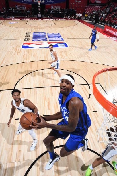 Tariq Owens of the Dallas Mavericks shoots the ball during the game against the Philadelphia 76ers during the 2021 Las Vegas Summer League on August...