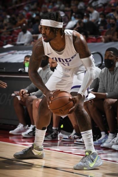 Ade Murkey of the Sacramento Kings dribbles the ball during the game against the Charlotte Hornets during the 2021 Las Vegas Summer League on August...