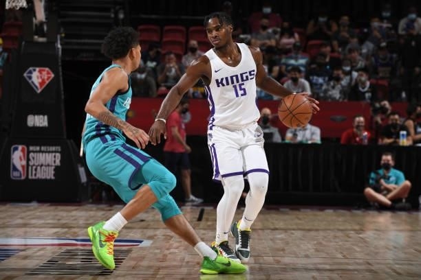 Davion Mitchell of the Sacramento Kings dribbles the ball during the game against the Charlotte Hornets during the 2021 Las Vegas Summer League on...