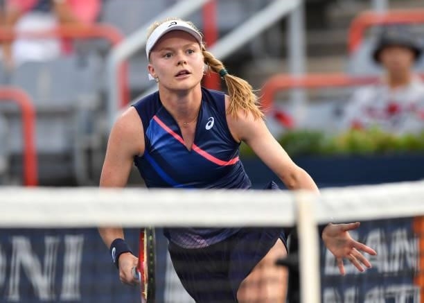 Harriet Dart of Great Britain runs towards the net during her Womens Singles first round match against Leylah Fernandez of Canada on Day One of the...