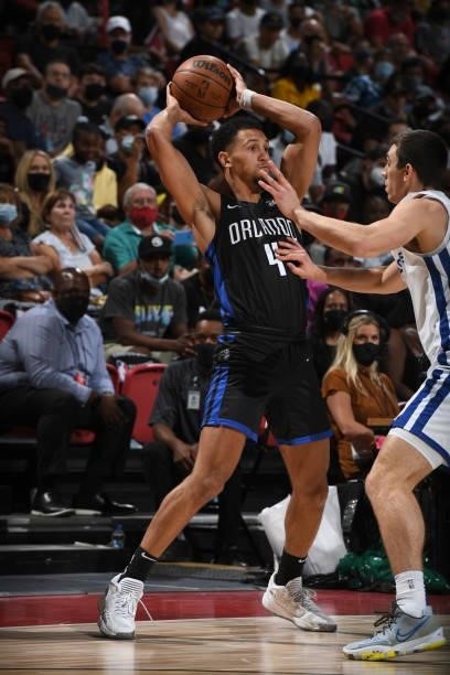Jalen Suggs of the Orlando Magic looks to pass the ball against the Golden State Warriors during the 2021 Las Vegas Summer League on August 9, 2021...