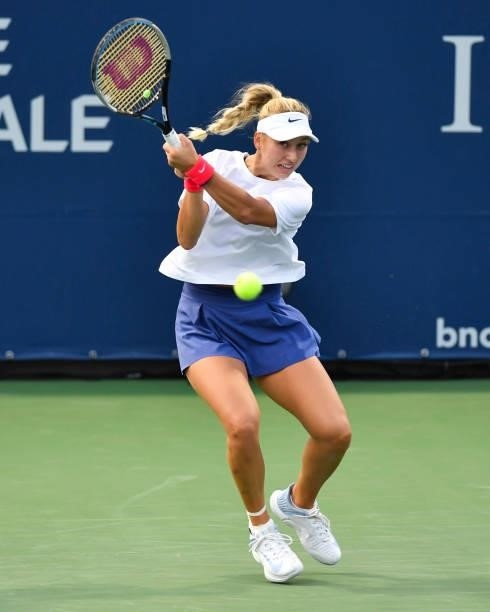 Anastasia Potapova of Russia hits a return during her Womens Singles first round match against Shelby Rogers of the United States on Day One of the...