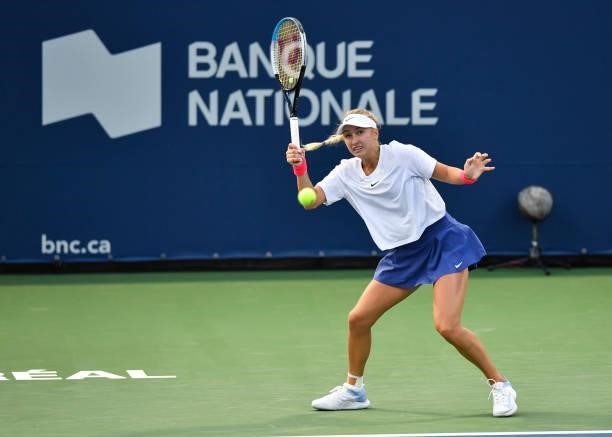 Anastasia Potapova of Russia hits a return during her Womens Singles first round match against Shelby Rogers of the United States on Day One of the...
