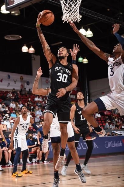 Jaylen Morris of the San Antonio Spurs drives to the basket against the Minnesota Timberwolves during the 2021 Las Vegas Summer League on August 9,...