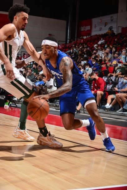 Jay Scrubb of the LA Clippers dribbles the ball against the Milwaukee Bucks during the 2021 Las Vegas Summer League on August 9, 2021 at the Cox...