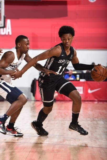 Josh Primo of the San Antonio Spurs drives to the basket against the Minnesota Timberwolves during the 2021 Las Vegas Summer League on August 9, 2021...