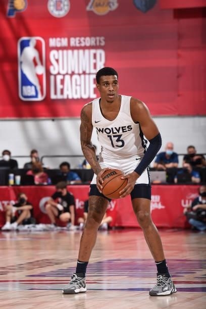 Kenny Wooten of the Minnesota Timberwolves looks to pass the ball against the San Antonio Spurs during the 2021 Las Vegas Summer League on August 9,...