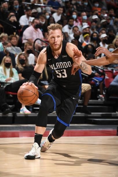Ignas Brazdeikis of the Orlando Magic drives to the basket against the Golden State Warriors during the 2021 Las Vegas Summer League on August 9,...
