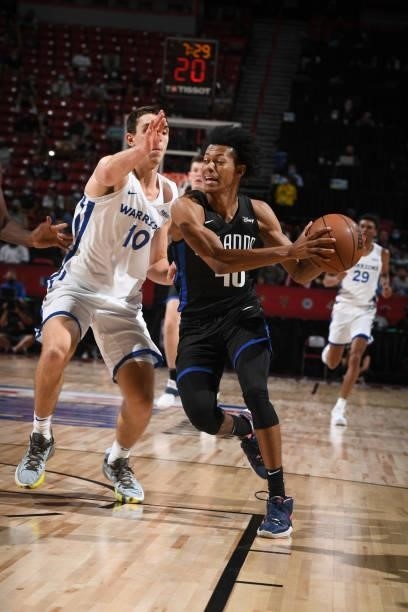 Jeff Dowtin of the Orlando Magic drives to the basket against the Golden State Warriors during the 2021 Las Vegas Summer League on August 9, 2021 at...