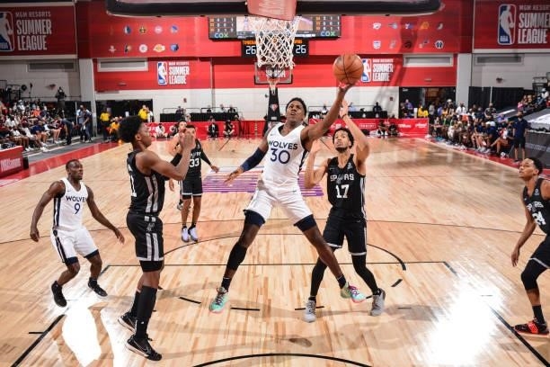 Nathan Knight of the Minnesota Timberwolves drives to the basket against the San Antonio Spurs during the 2021 Las Vegas Summer League on August 9,...