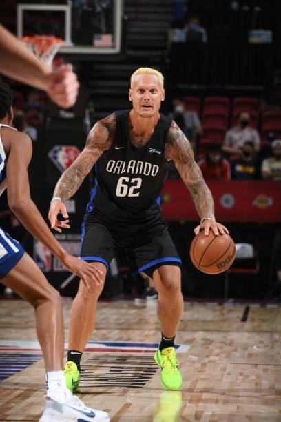 Janis Timma of the Orlando Magic handles the ball against the Golden State Warriors during the 2021 Las Vegas Summer League on August 9, 2021 at the...